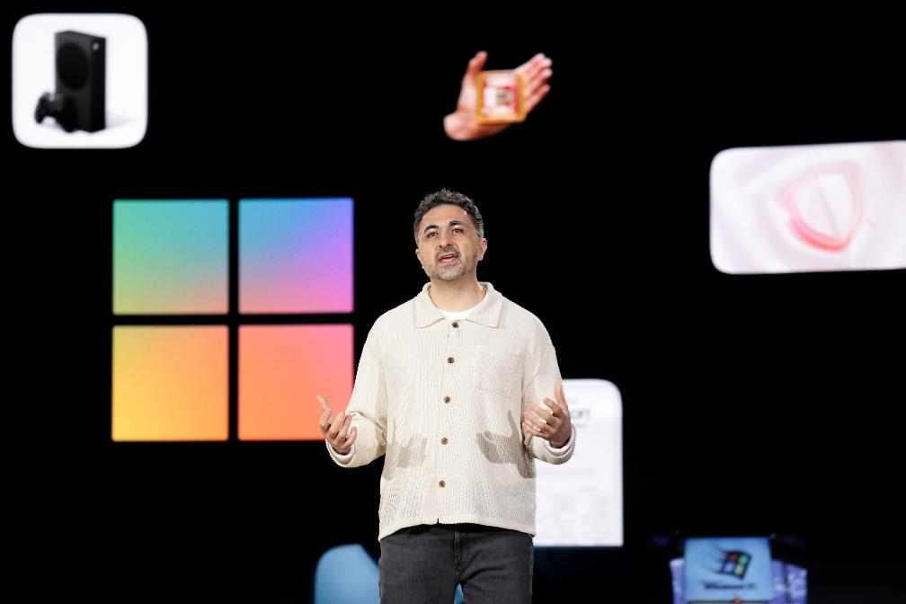 Mustafa Suleyman, Microsoft AI CEO, presenting at Microsoft headquarters in Redmond, April 2025 (AP Photo/Jason Redmond)